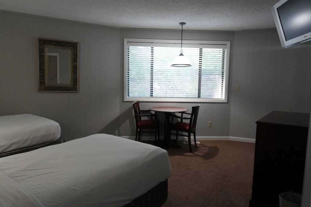 A two bedroom villa's second bedroom, with two twin beds