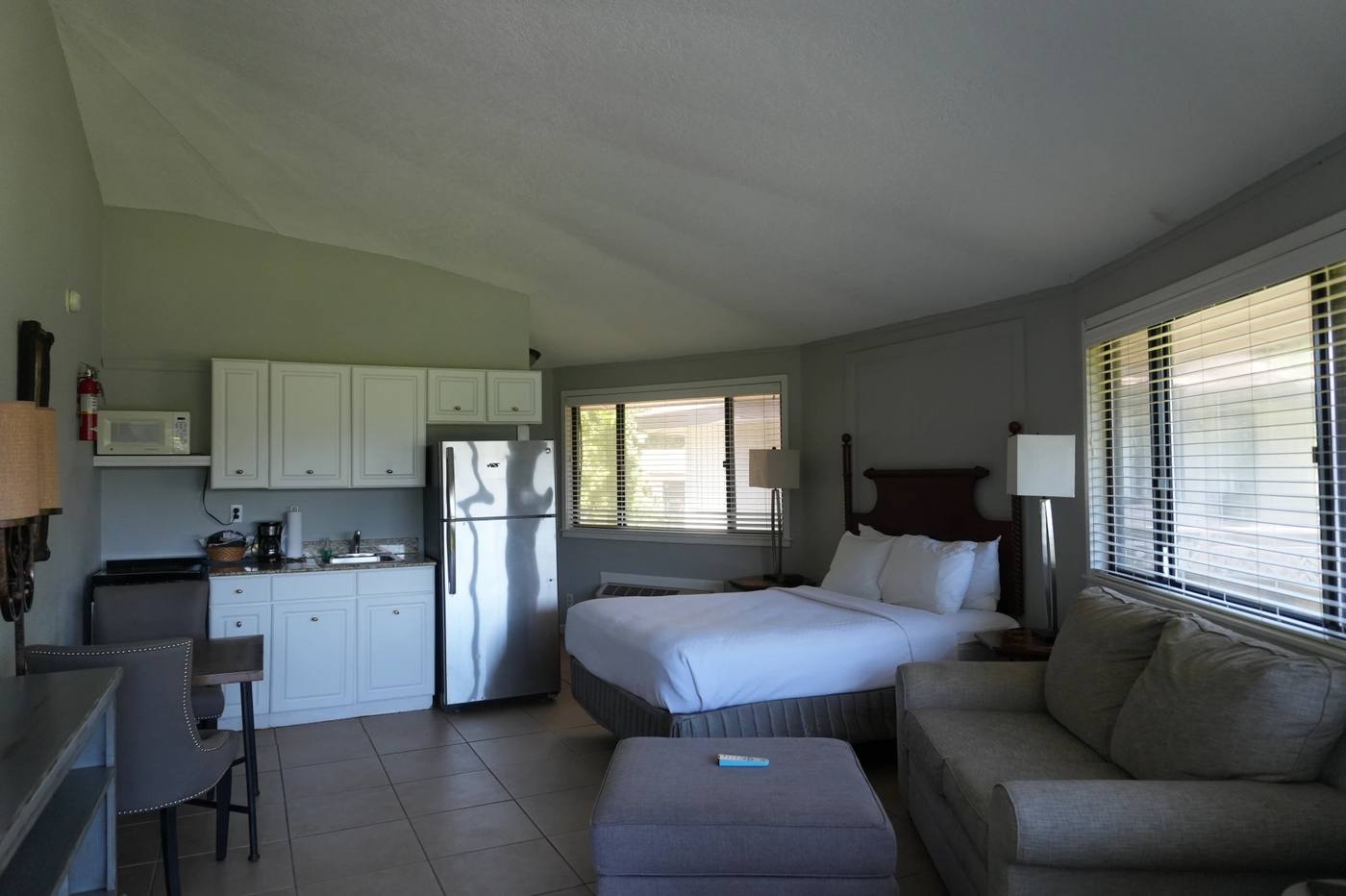 Studio villa with the bed, sofa and kitchenette in one open room